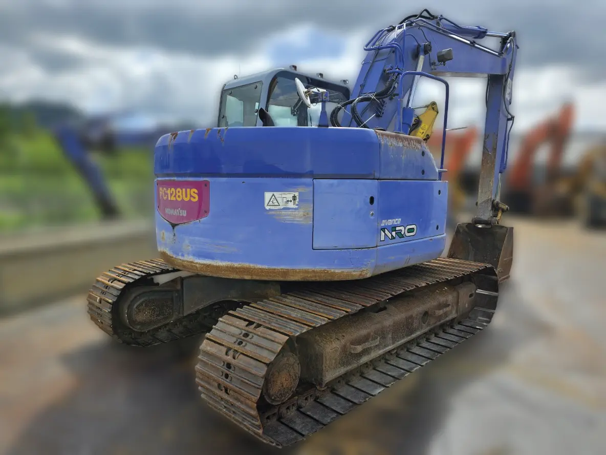 KOMATSU PC128US-2 - 6986, tampak samping kiri