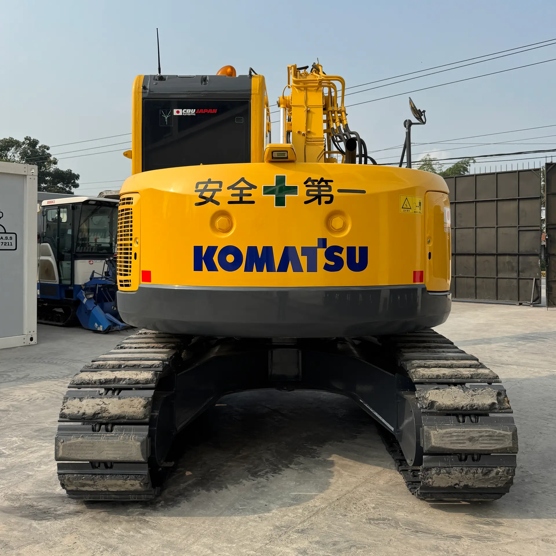 KOMATSU PC128US-8 - 22146, rear view