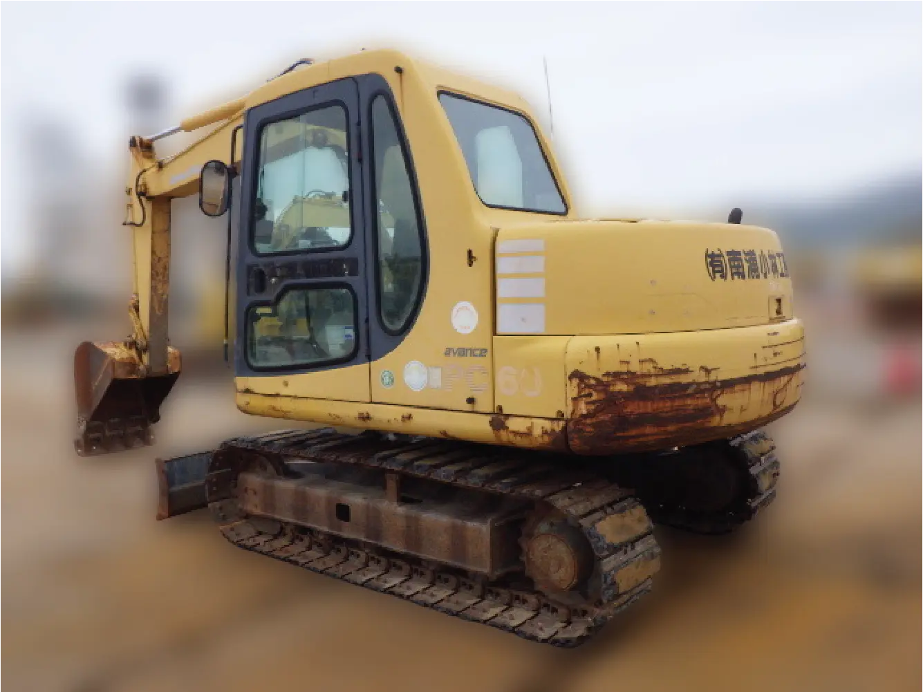 KOMATSU PC60-7C - 58586, rear view