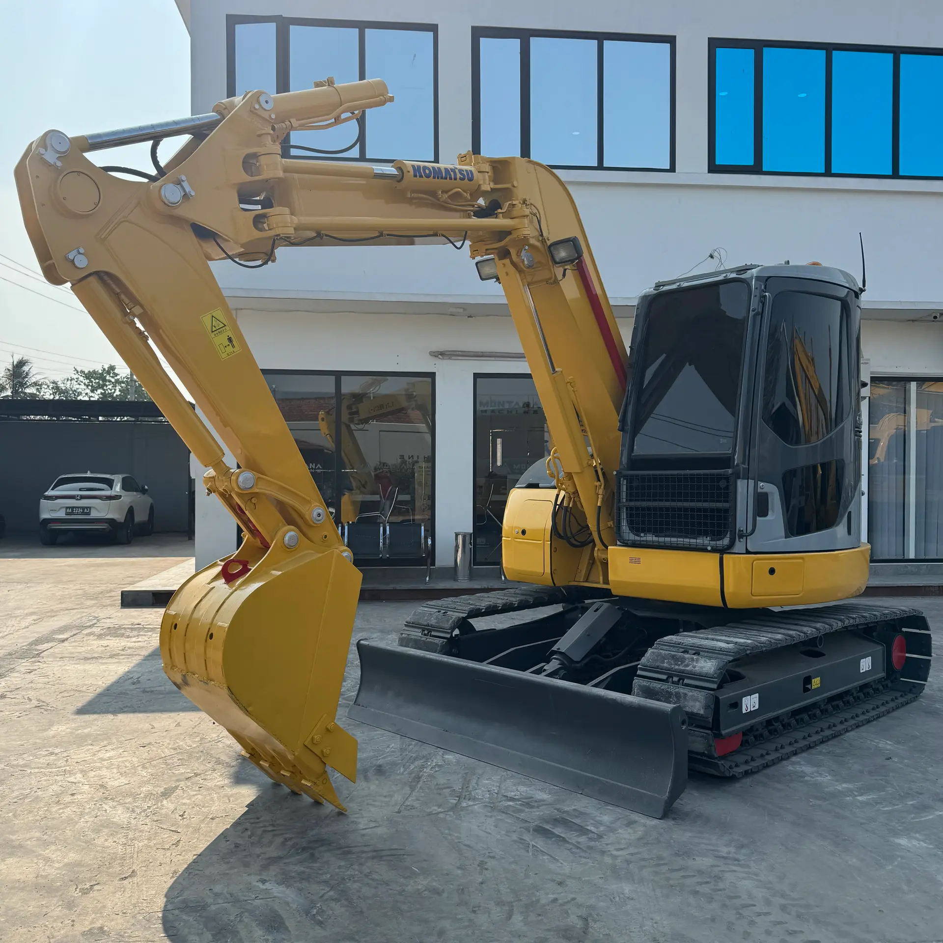 KOMATSU PC78UU-6E0 - 25767, full front view of the unit