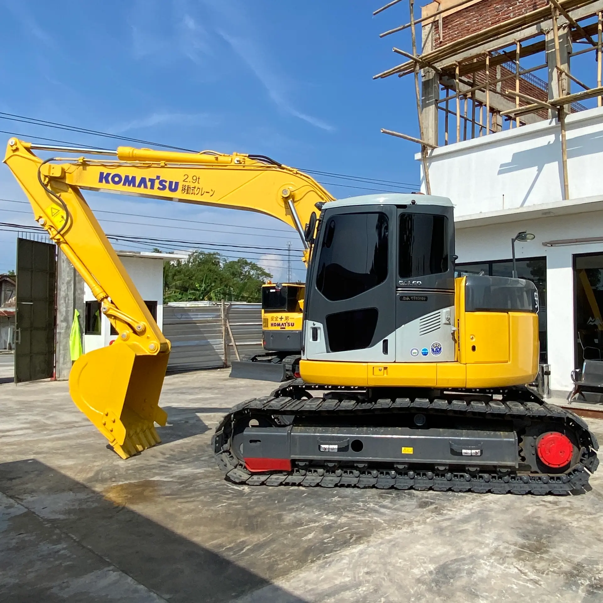 KOMATSU PC128US-2E1 - 9621, tampak samping kiri